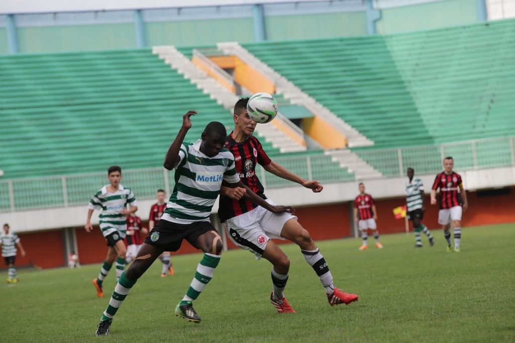 soccer fighting for the ball